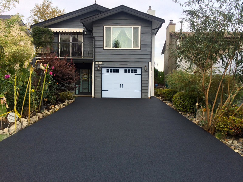 rubber driveway paving companies and driveway repairs to pavers in Vancouver Burnaby Coquitlam and Surrey