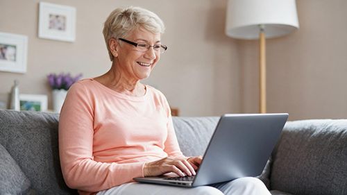 woman submitting quote on laptop